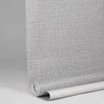 نمای نزدیک بافت برجسته کاغذ دیواری خاکستری