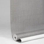 نمای نزدیک بافت برجسته کاغذ دیواری خاکستری